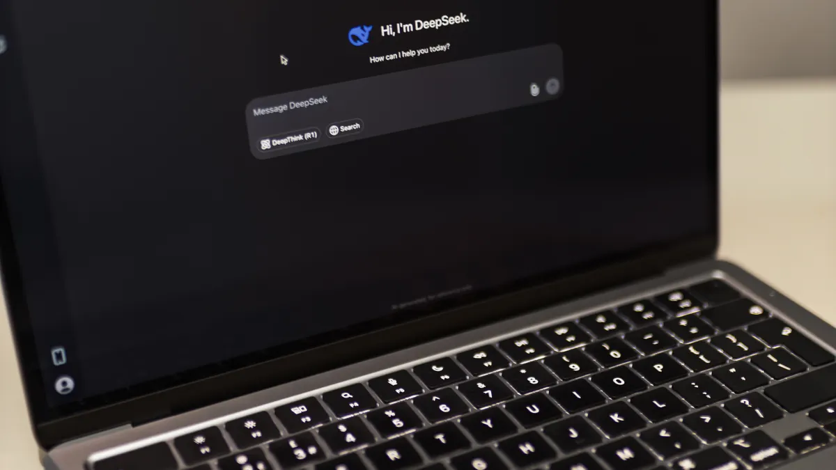 How agencies can use AI copywriting tools for client work — Laptop Displaying AI Conversation Interface