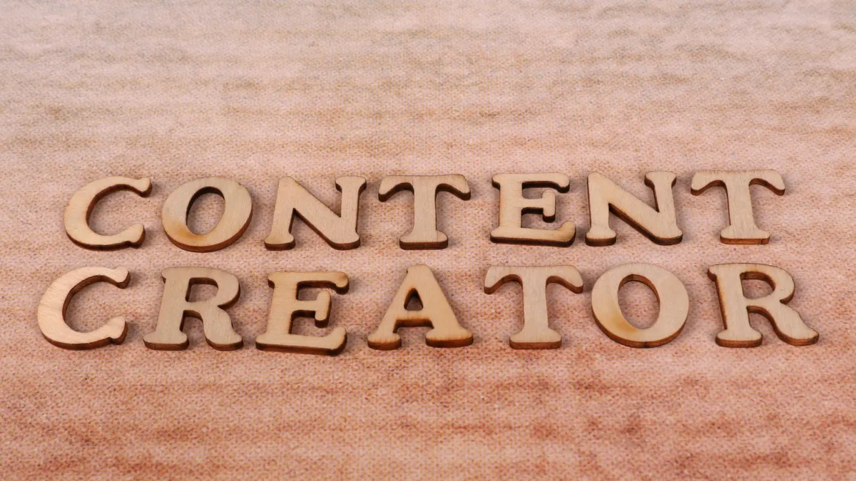 How to choose AI content writing tools for your team — Wooden Lettering 'Content Creator' on Textile